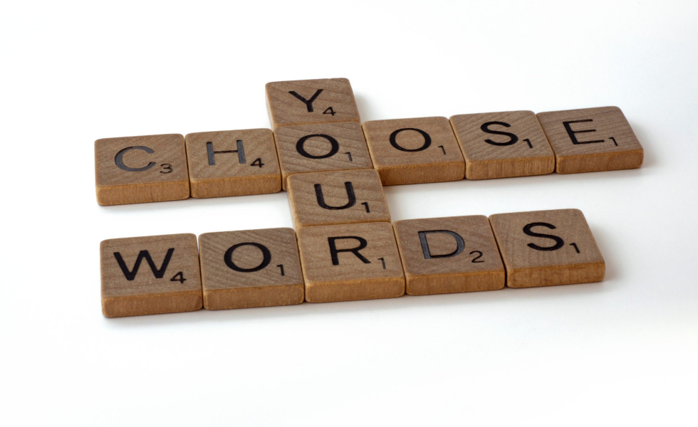 scrable letters that say "You choose your words"