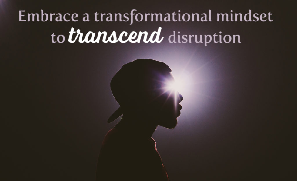 Man with backwards hat looking into the light with text that says "embrace a transformational mindset to transcend disruption."